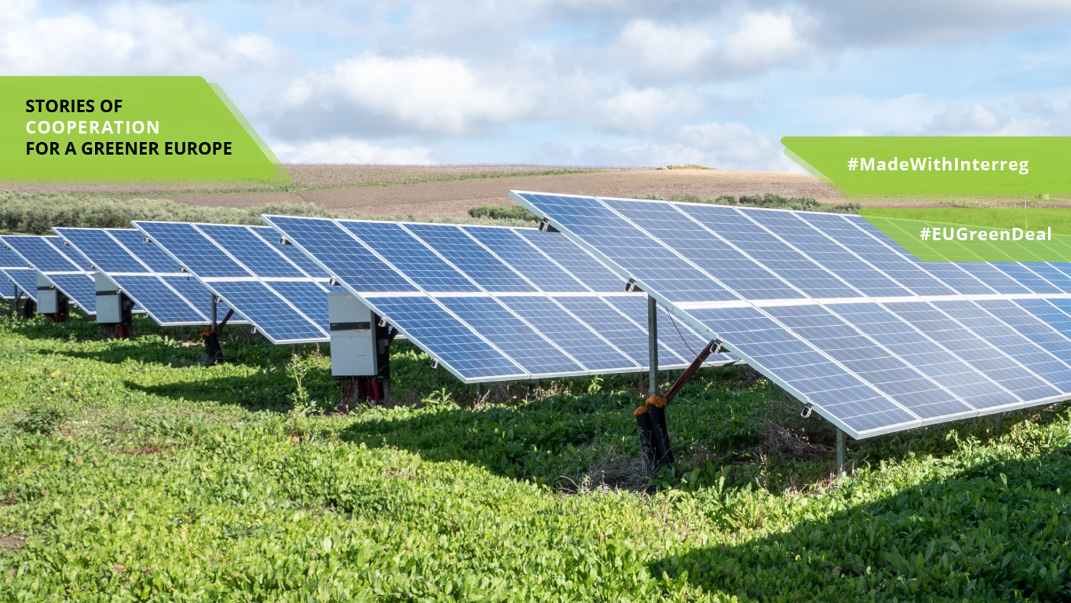 Rows of solar panels in a grassy field under a partly cloudy sky. Text on image reads, "Stories of cooperation for a greener Europe," "#MadeWithInterreg," and "#EUGreenDeal.