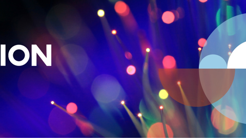 Abstract “Cooperation Day” banner with bold white text on a blurred, colorful background of light spots and fiber optic shapes. Geometric shapes and the EU Interreg Cooperation Day logo appear on the right.